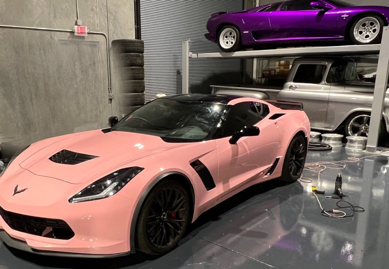 Completed gloss pink vinyl wrap on a Corvette